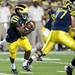 Junior quarterback Denard Robinson runs the ball during the first quarter Saturday against Notre Dame.
Melanie Maxwell | AnnArbor.com